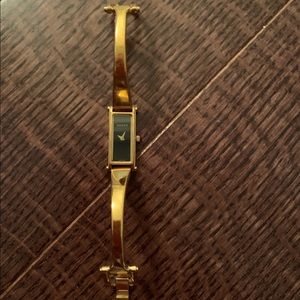 Gucci gold watch
